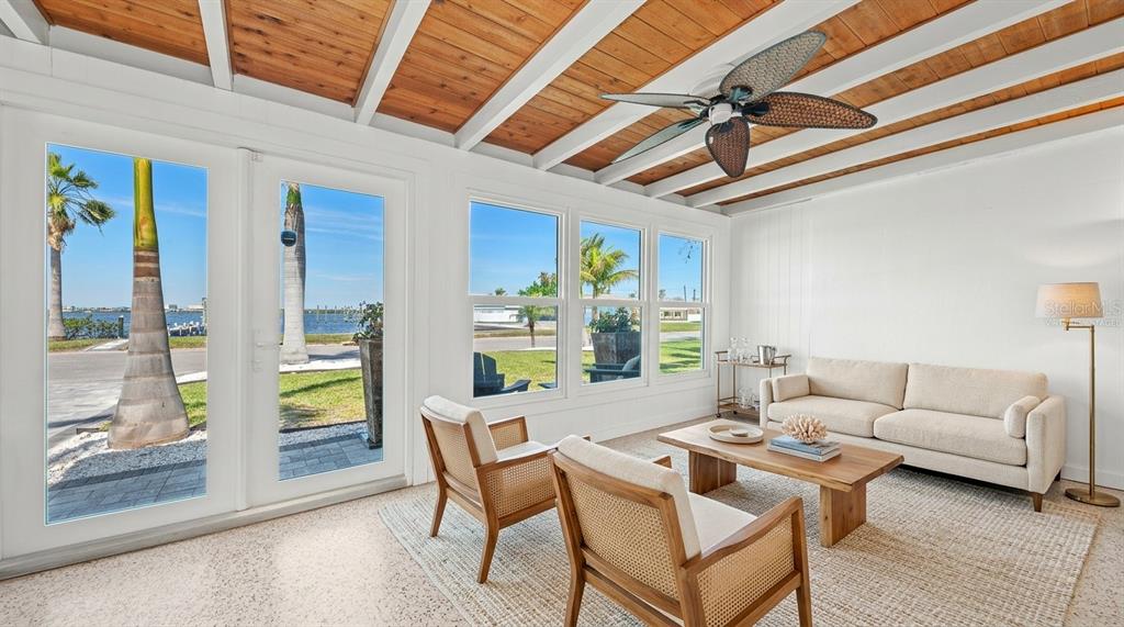 2014 Riverside Drive East Bradenton, FL 34208 - Photo 15 of 66 a living room with furniture a ceiling fan and a rug