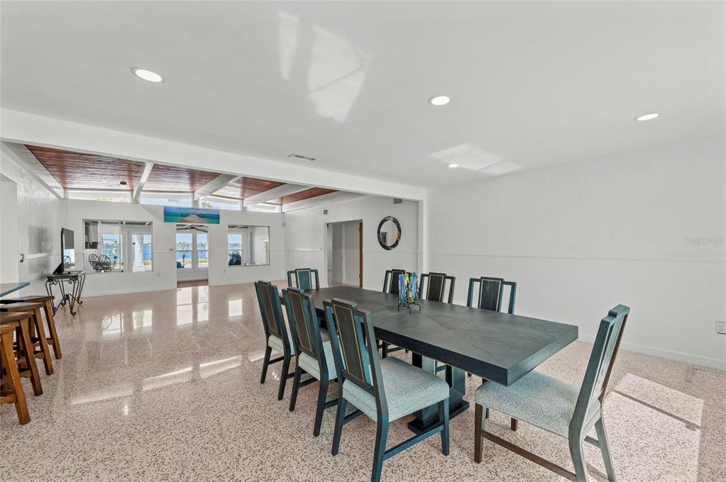 2014 Riverside Drive East Bradenton, FL 34208 - Photo 26 of 66 a view of a dining room with furniture and wooden floor