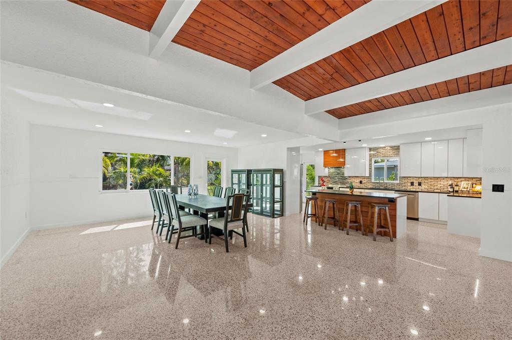2014 Riverside Drive East Bradenton, FL 34208 - Photo 27 of 66 a living room with lots of furniture and kitchen view