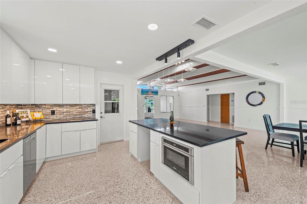 2014 Riverside Drive East Bradenton, FL 34208 - Photo 32 of 66 a kitchen that has a sink and a stove