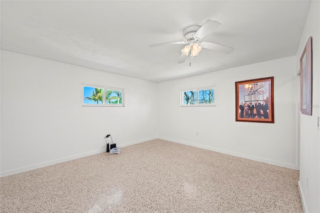 2014 Riverside Drive East Bradenton, FL 34208 - Photo 37 of 66 a view of a livingroom with a ceiling fan and window