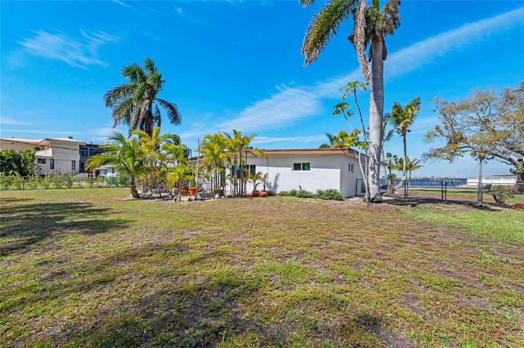 2014 Riverside Drive East Bradenton, FL 34208 - Photo 48 of 66 a front view of a house with garden