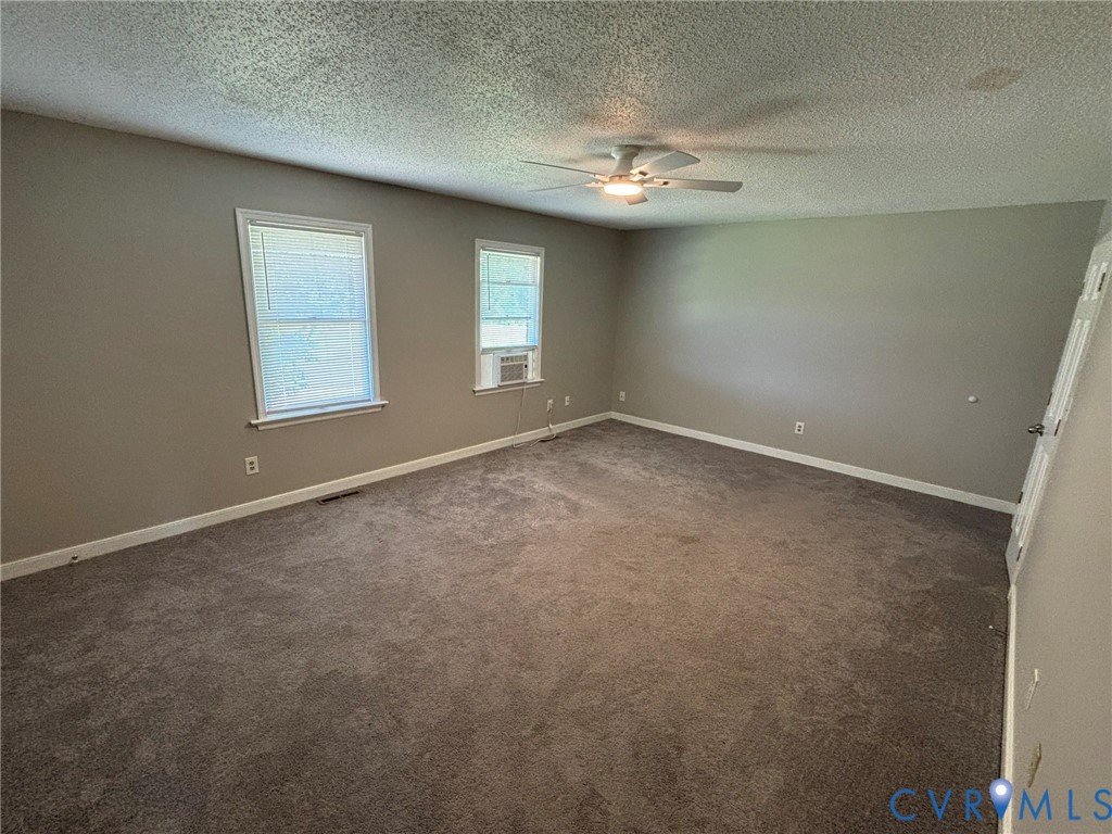 8630 Richmond Road Toano, VA 23168 - Photo 9 of 22 Primary Bedroom Unit A 19x13