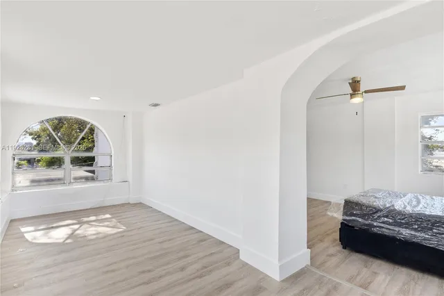 a view of livingroom with furniture and window
