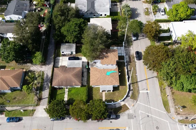an aerial view of a house with outdoor space