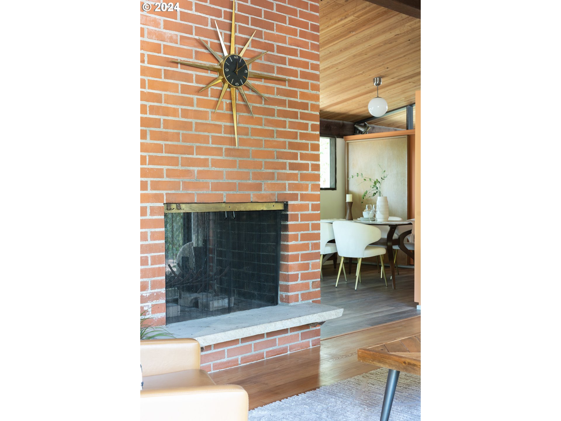 12325 Southwest Park Way Portland, OR 97225 - Photo 13 of 40 a living room with a chair and a fireplace