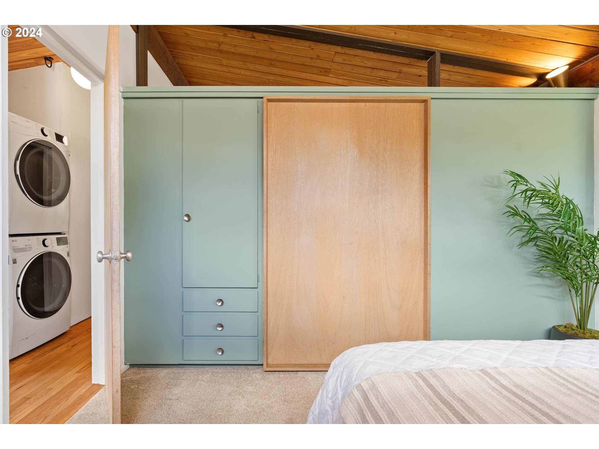12325 Southwest Park Way Portland, OR 97225 - Photo 20 of 40 a bedroom with a bed and a dresser