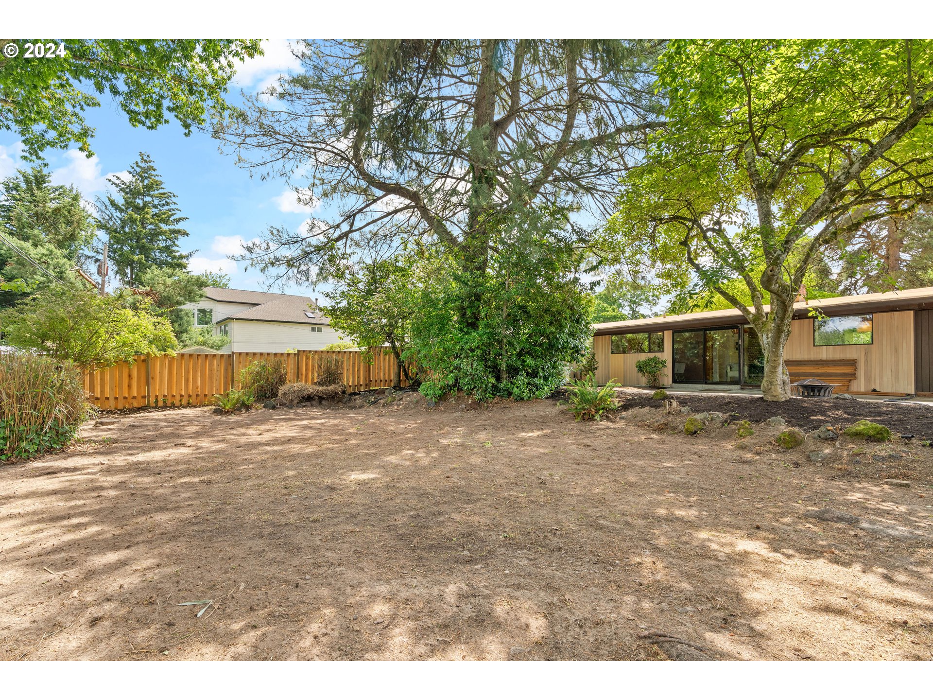 12325 Southwest Park Way Portland, OR 97225 - Photo 32 of 40 a front view of a house with a garden
