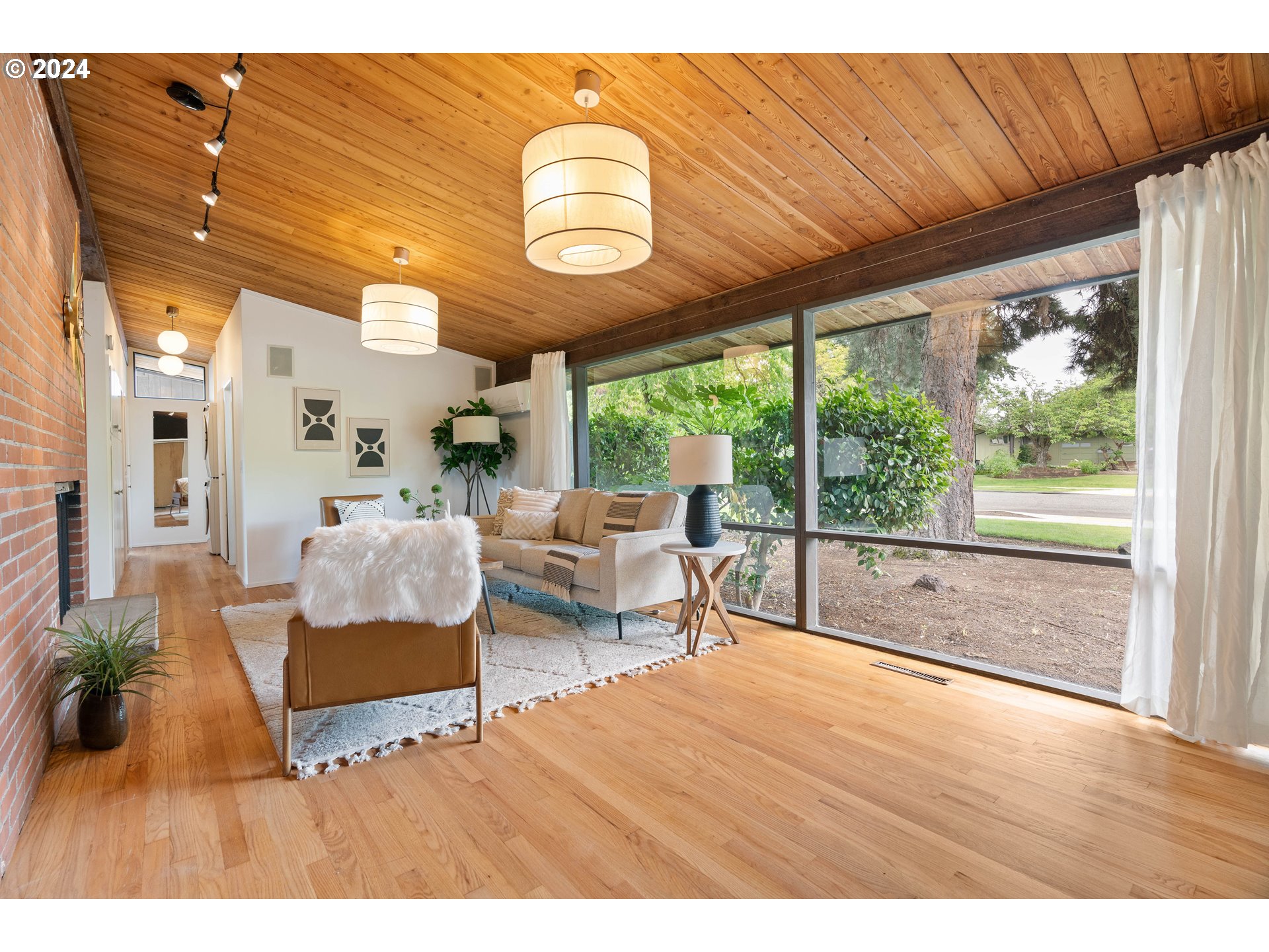12325 Southwest Park Way Portland, OR 97225 - Photo 4 of 40 a living room with furniture and a large window