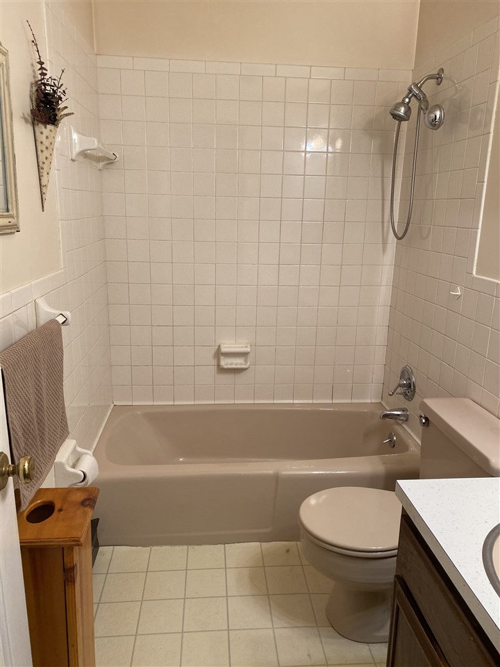1770 Shutterlee Mill Road Staunton, VA 24401 - Photo 17 of 38 a bathroom with a sink a toilet and shower