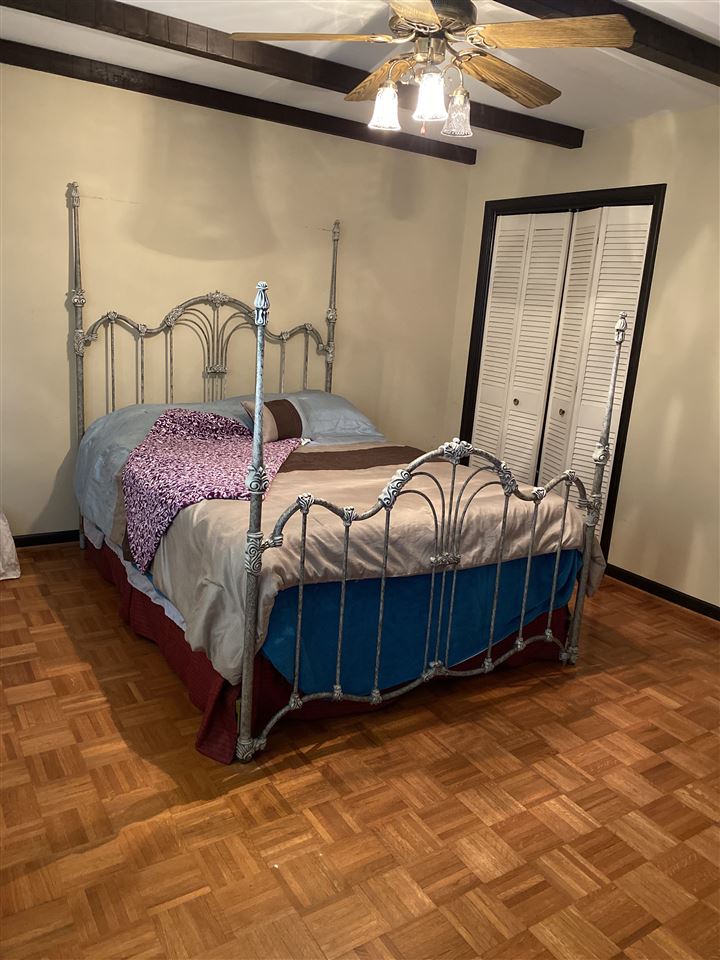1770 Shutterlee Mill Road Staunton, VA 24401 - Photo 21 of 38 a bedroom with a bed and a mirror