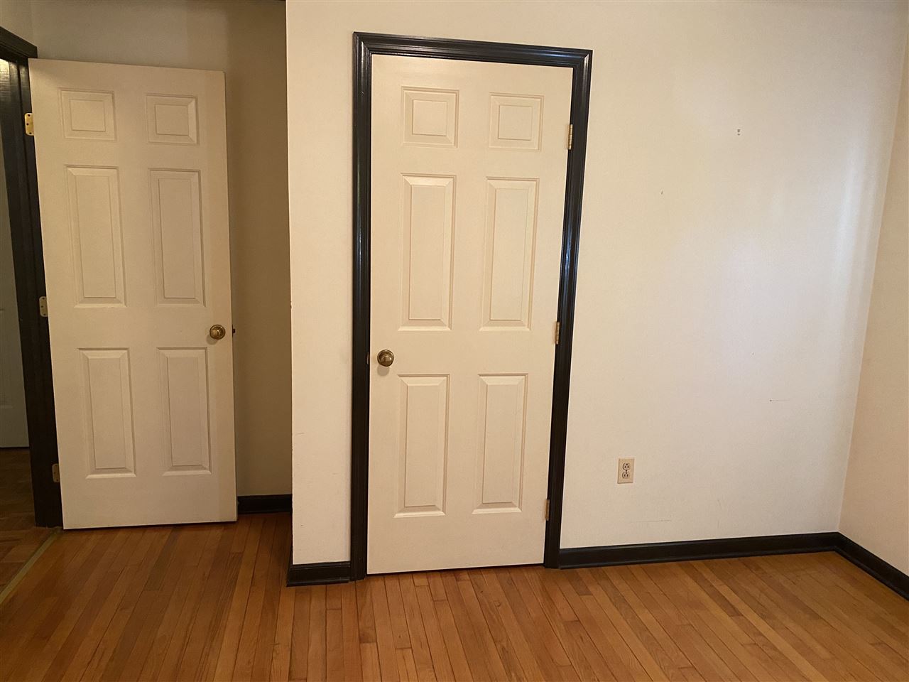 1770 Shutterlee Mill Road Staunton, VA 24401 - Photo 26 of 38 a view of an empty room with wooden floor and closet area