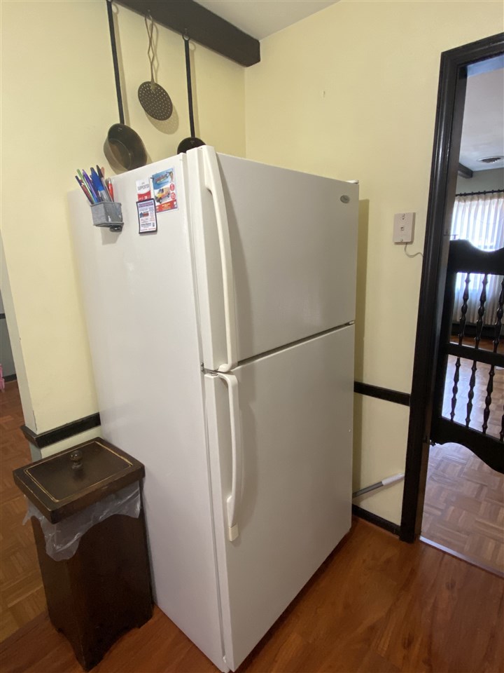 1770 Shutterlee Mill Road Staunton, VA 24401 - Photo 9 of 38 a white refrigerator freezer and a stove sitting inside of a kitchen