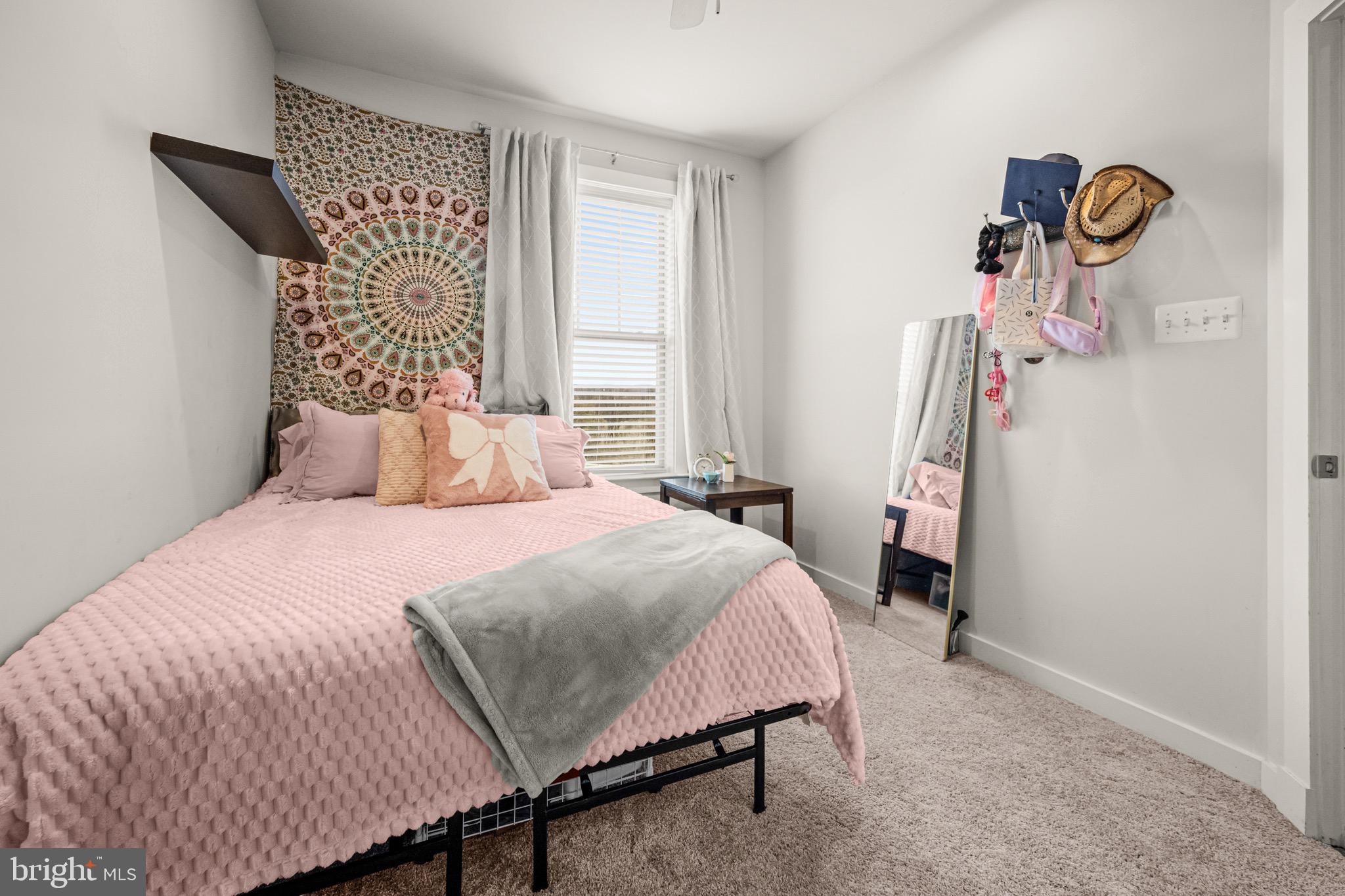 3313 Stone Barn Drive Frederick, MD 21704 - Photo 27 of 47 a bedroom with a bed and a window