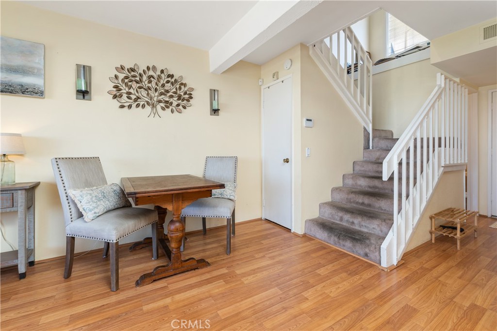 567 Avenida Adobe San Clemente, CA 92672 - Photo 18 of 33 a living room with furniture and a wooden floor