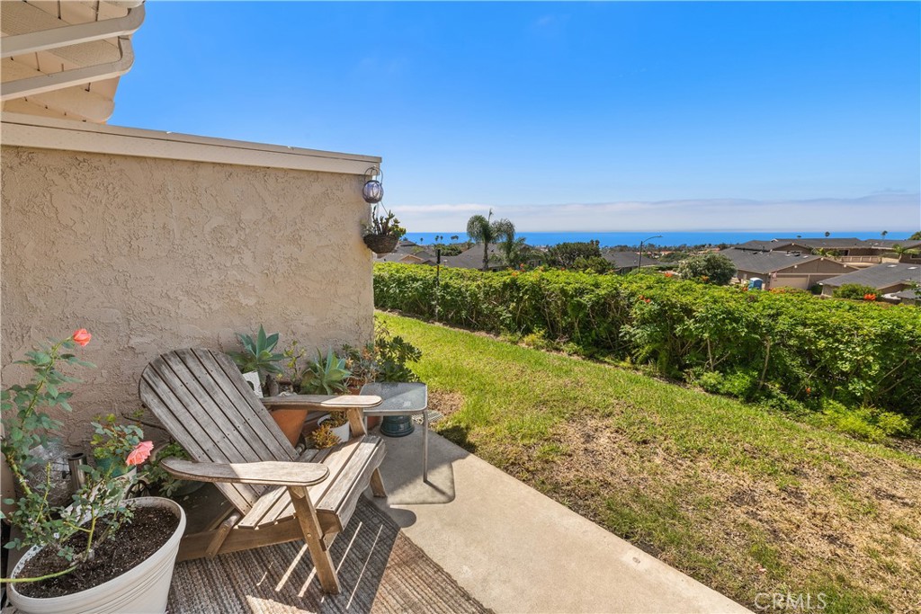 567 Avenida Adobe San Clemente, CA 92672 - Photo 25 of 33 a view of a chairs and table in the patio