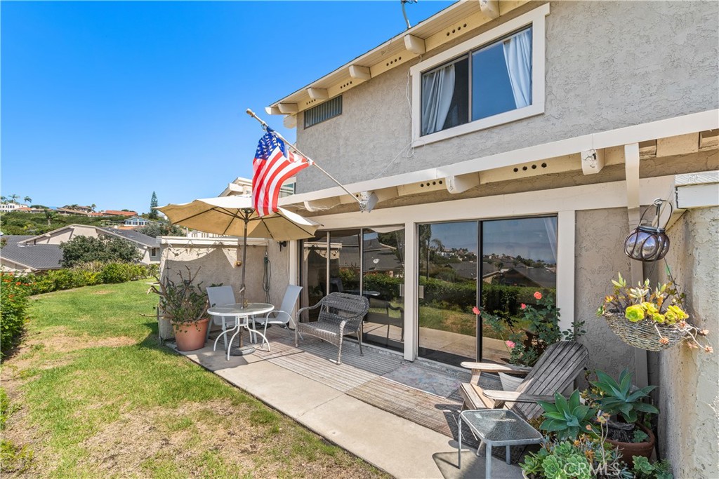 567 Avenida Adobe San Clemente, CA 92672 - Photo 27 of 33 a view of a chairs and table in patio