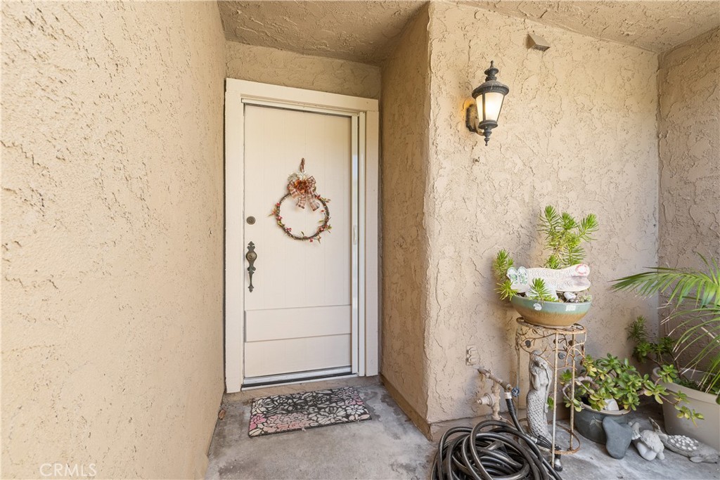 567 Avenida Adobe San Clemente, CA 92672 - Photo 4 of 33 a view of entryway with wooden floor