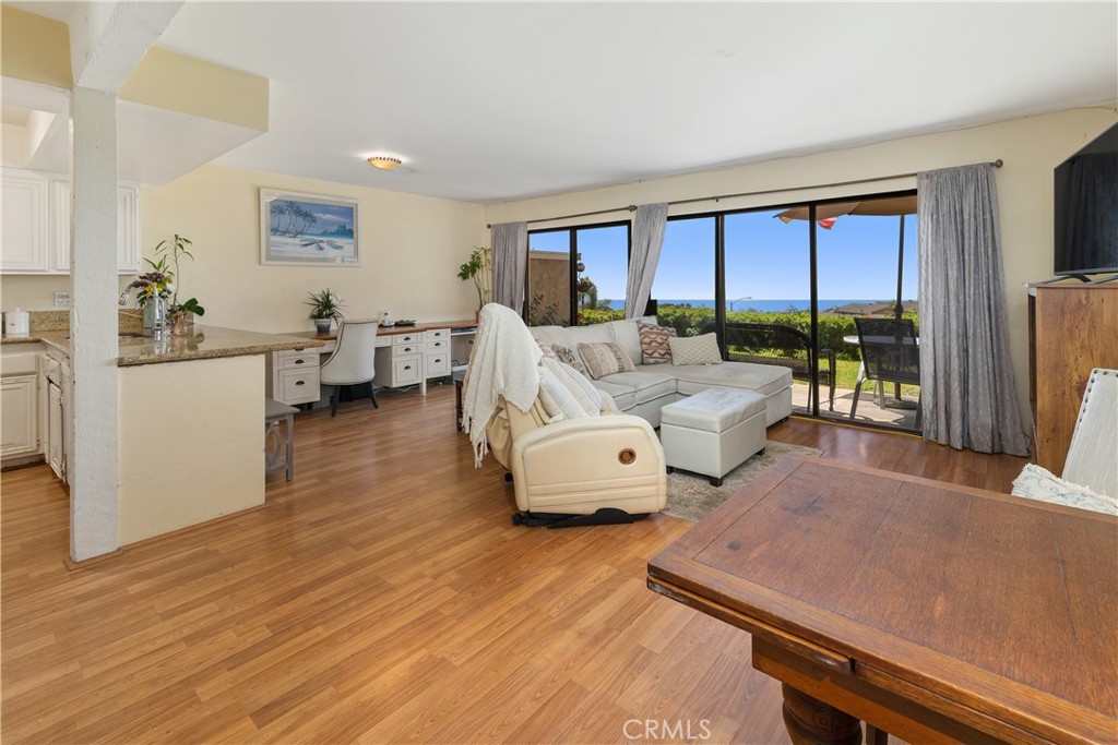 567 Avenida Adobe San Clemente, CA 92672 - Photo 5 of 33 a bedroom with furniture and wooden floor