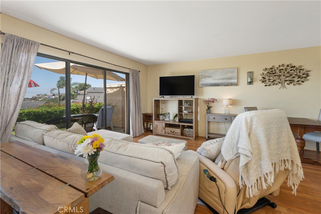 567 Avenida Adobe San Clemente, CA 92672 - Photo 8 of 33 a living room with furniture and a flat screen tv