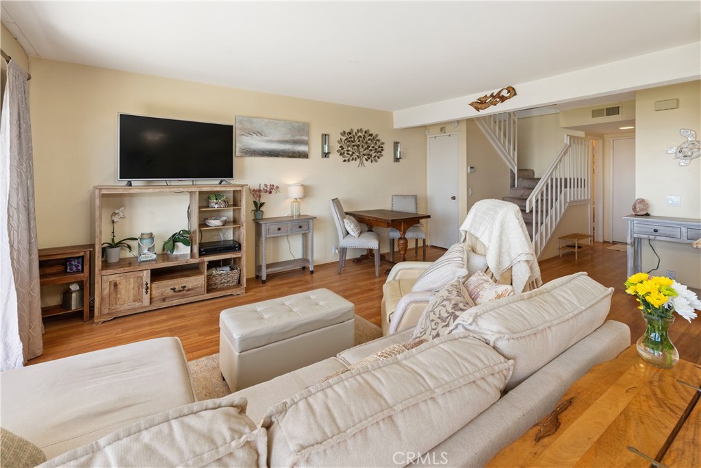 567 Avenida Adobe San Clemente, CA 92672 - Photo 9 of 33 a living room with furniture and a flat screen tv