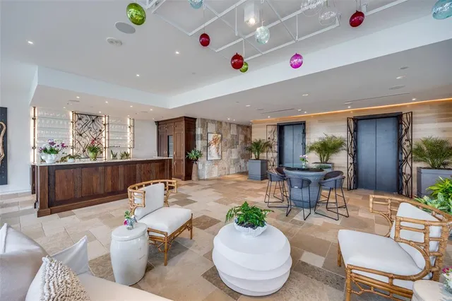 a kitchen with stove a sink and a refrigerator