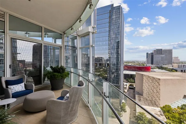 a view of a patio with couches and a big yard