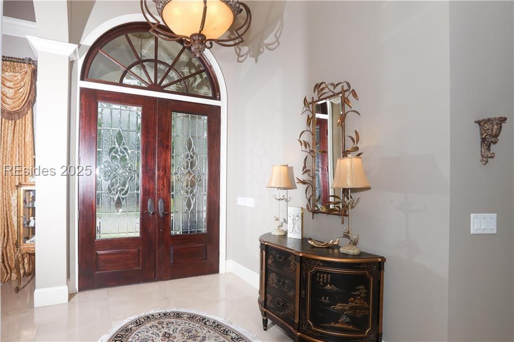 21 Caravelle Lane Bluffton, SC 29909 - Photo 3 of 66 Gorgeous double doors with arched window above let