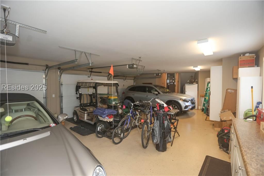 21 Caravelle Lane Bluffton, SC 29909 - Photo 58 of 66 3.5 vehicle OVERSIZED garage which has 2 work benc