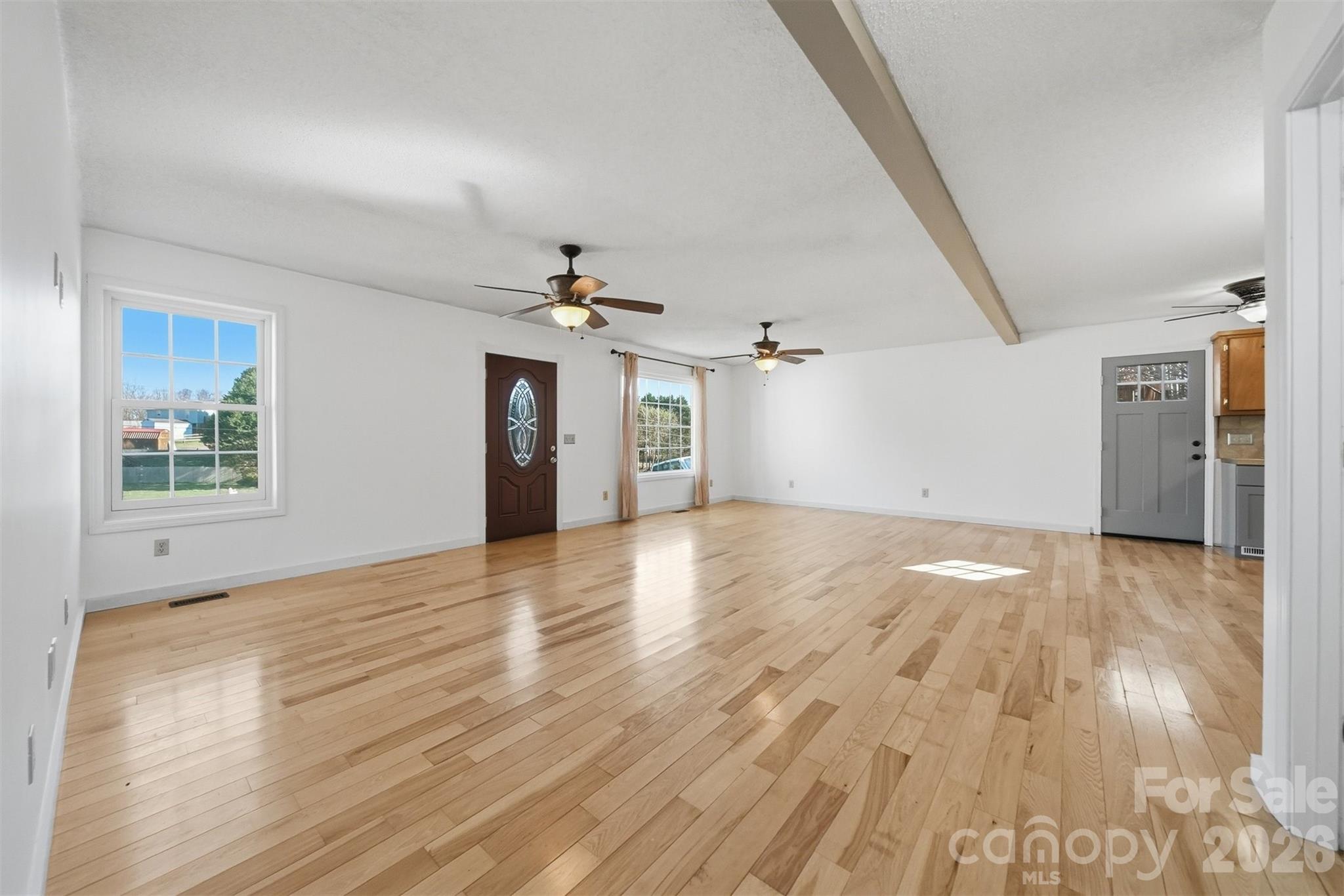 4771 Petra Mill Road Granite Falls, NC 28630 - Photo 16 of 46 a view of a livingroom with wooden floor