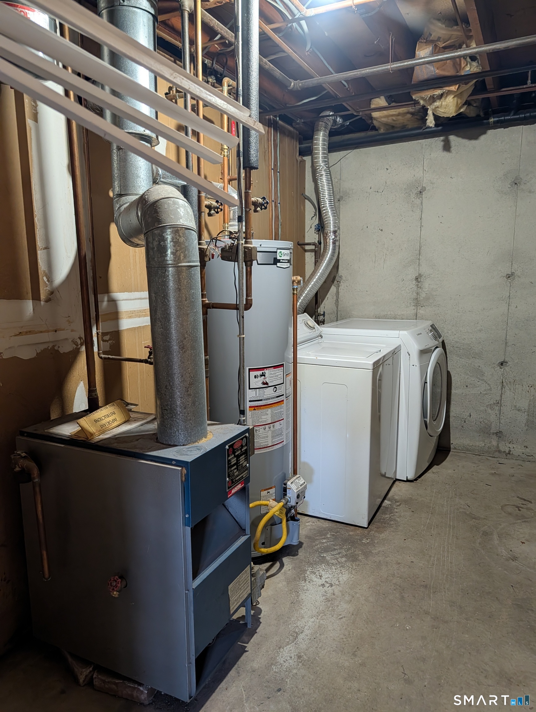 267 Beaver Street Ansonia, CT 06401 - Photo 10 of 12 a utility room with dryer and washer