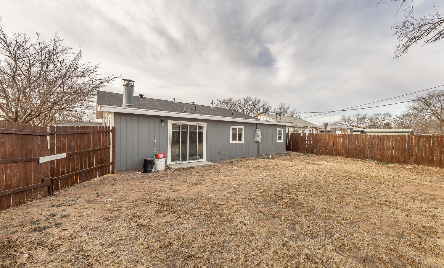 2002 65th Street Lubbock, TX 79412 - Photo 21 of 25 a view of a house with a patio