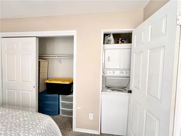 a kitchen with a refrigerator and a stove
