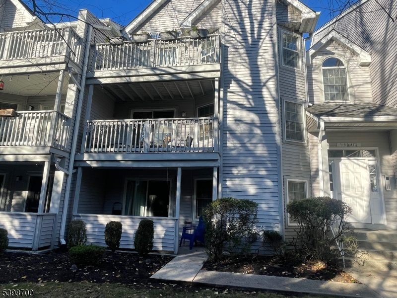 3 Quartz Lane, Unit 3 Paterson, NJ 07501 - Photo 2 of 10 a front view of a house with balcony