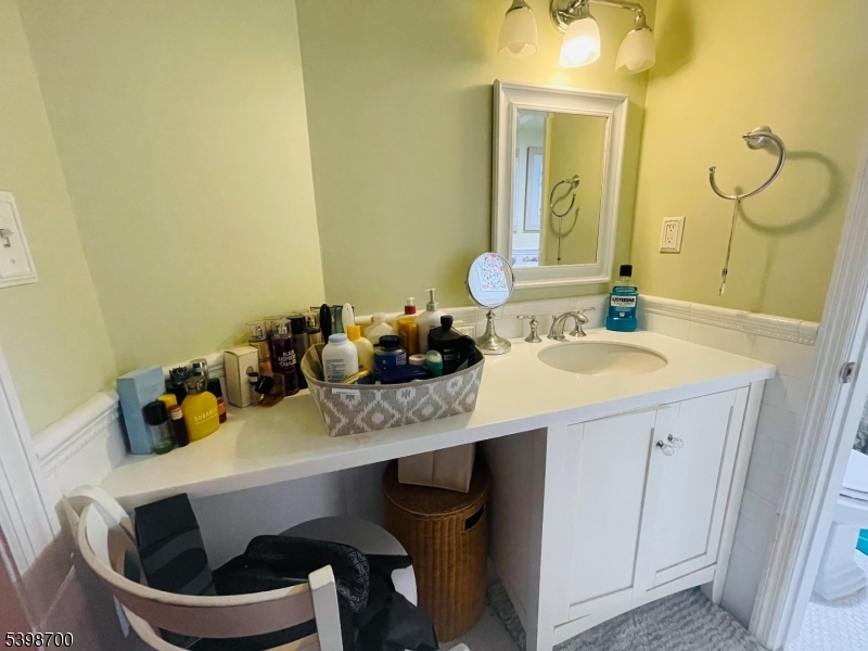 3 Quartz Lane, Unit 3 Paterson, NJ 07501 - Photo 7 of 10 a bathroom with a sink and a mirror