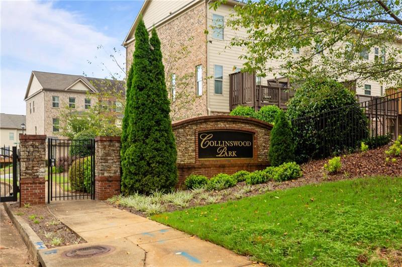 2744 Blakely Drive Northeast Suwanee, GA 30024 - Photo 44 of 45 a sign that is sitting in front of a brick house with plants