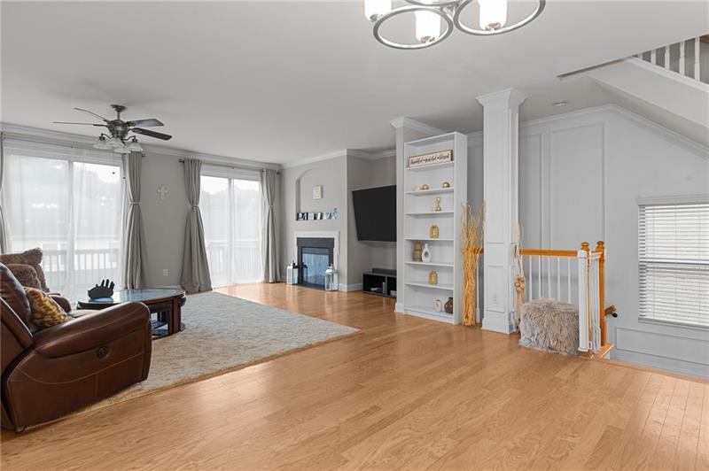 2744 Blakely Drive Northeast Suwanee, GA 30024 - Photo 5 of 45 a view of a livingroom with furniture and windows