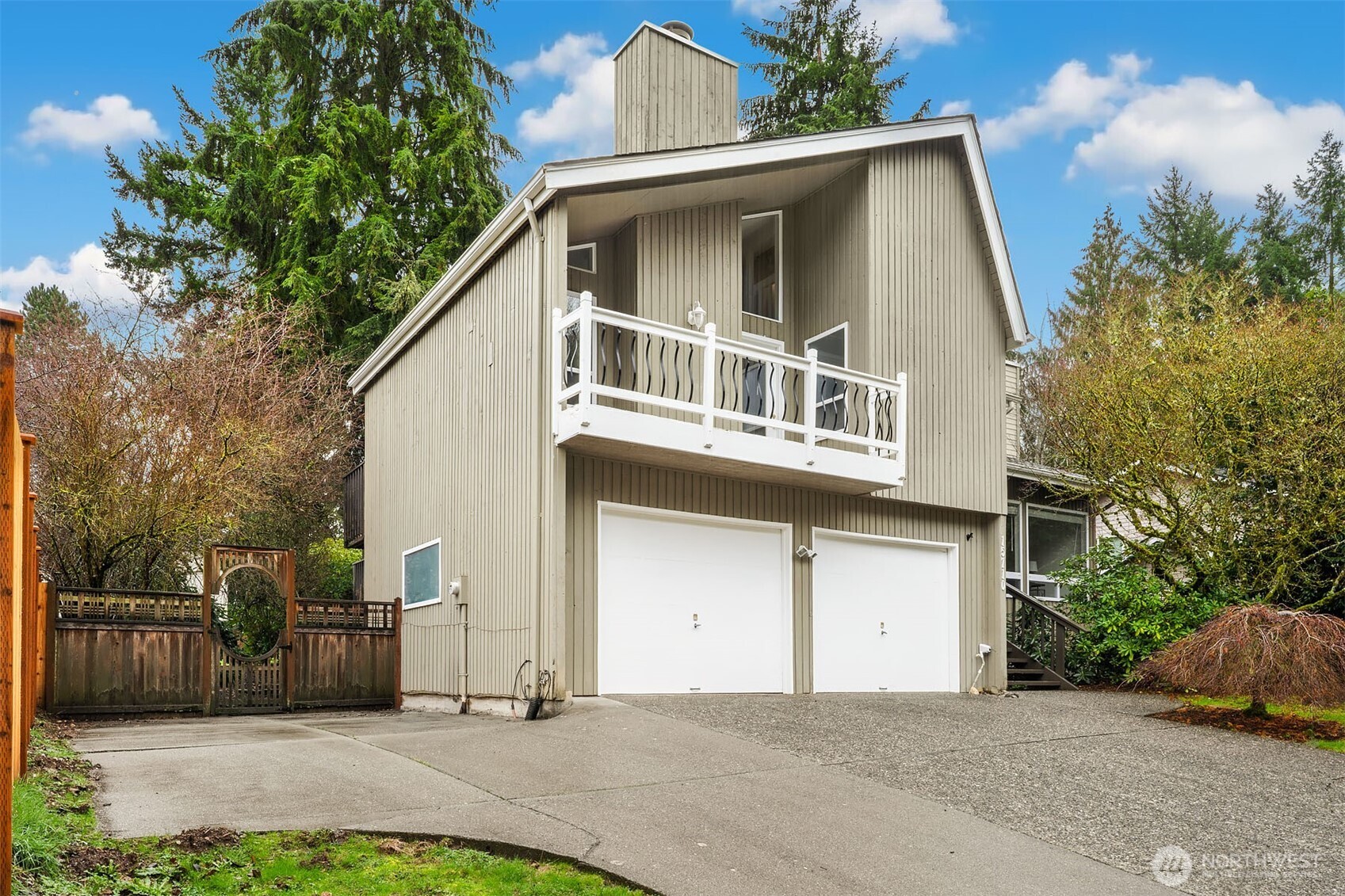 15710 Southeast 46th Way Bellevue, WA 98006 - Photo 2 of 40 a front view of a house with garage