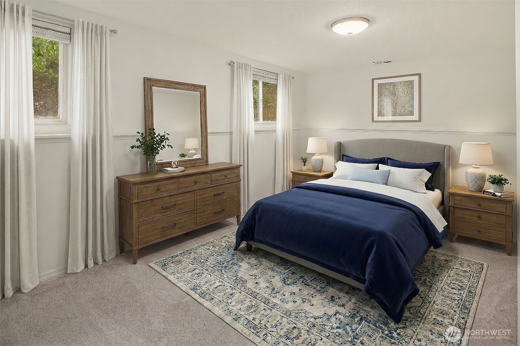 15710 Southeast 46th Way Bellevue, WA 98006 - Photo 26 of 40 a bedroom with a bed and a chandelier