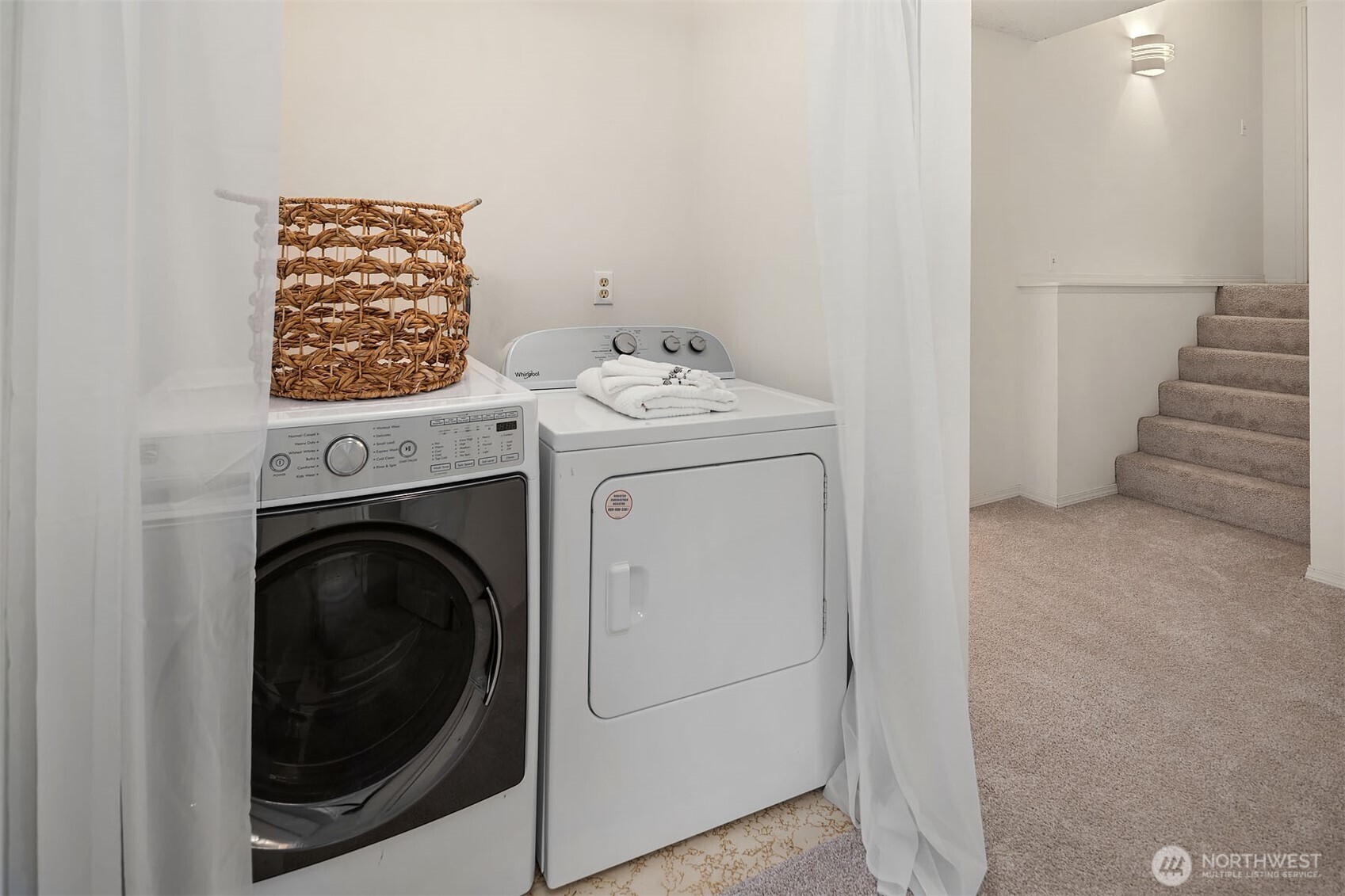 15710 Southeast 46th Way Bellevue, WA 98006 - Photo 27 of 40 a utility room with dryer and washer