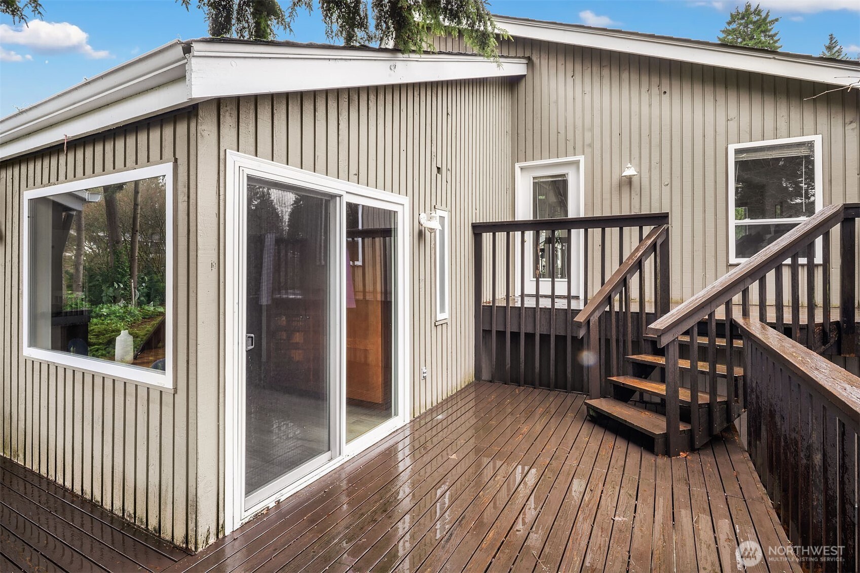 15710 Southeast 46th Way Bellevue, WA 98006 - Photo 30 of 40 a view of a house with wooden deck