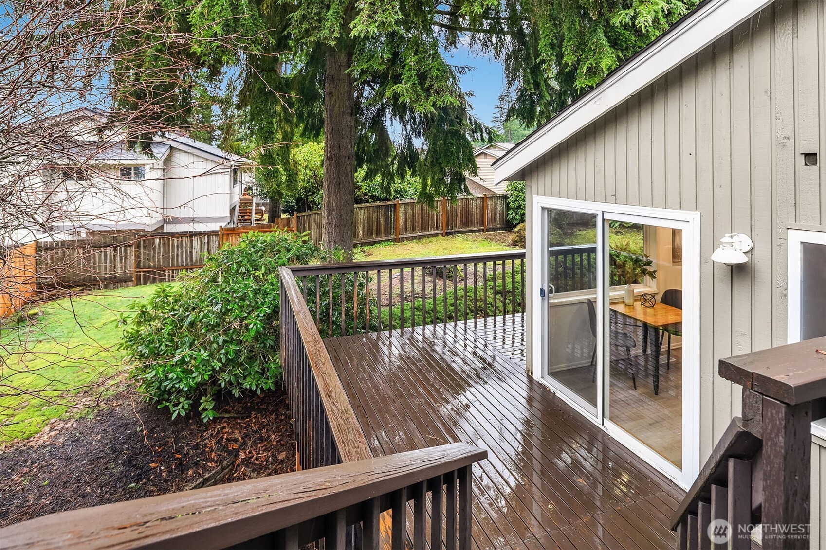 15710 Southeast 46th Way Bellevue, WA 98006 - Photo 32 of 40 a view of balcony with wooden floor and fence