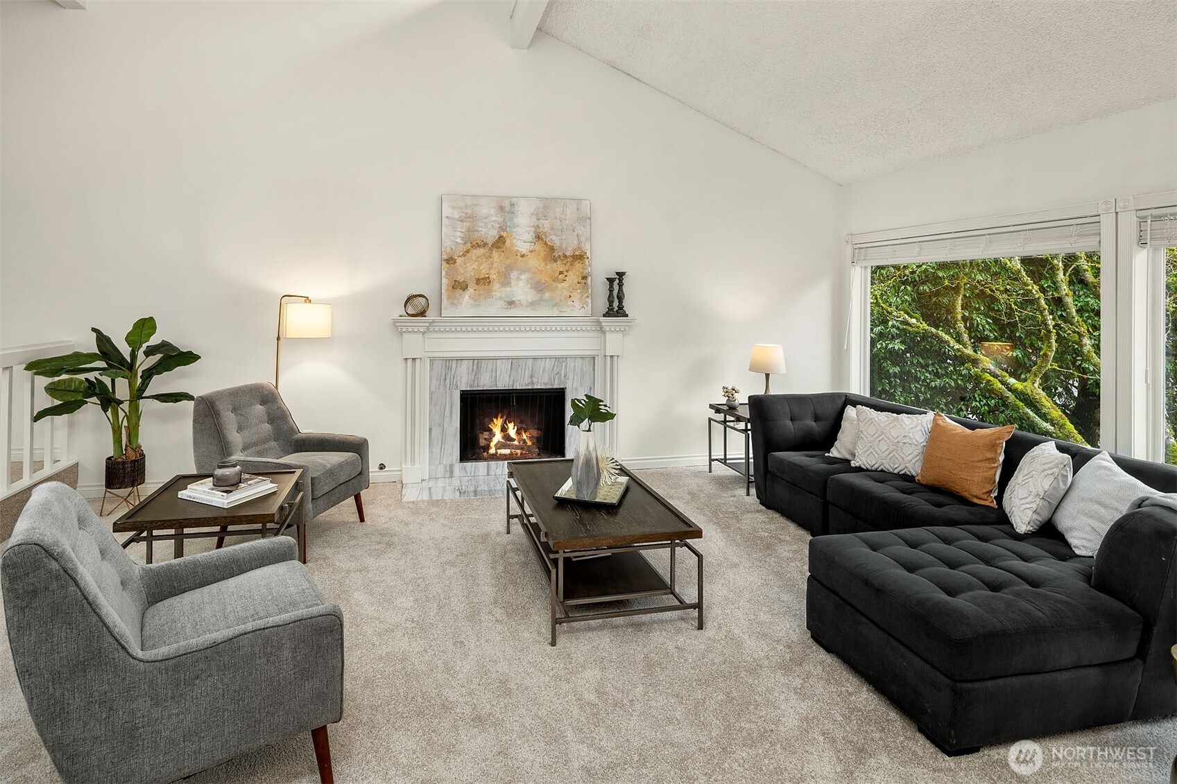 15710 Southeast 46th Way Bellevue, WA 98006 - Photo 4 of 40 a living room with furniture and a fireplace