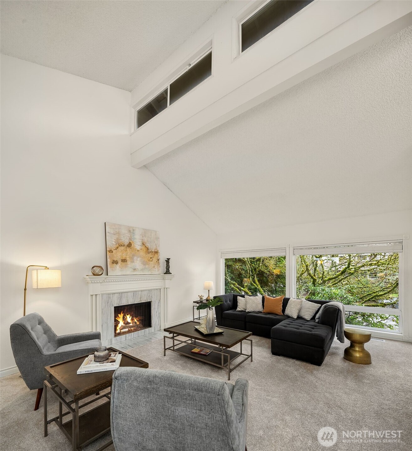 15710 Southeast 46th Way Bellevue, WA 98006 - Photo 5 of 40 a living room with furniture and a fireplace