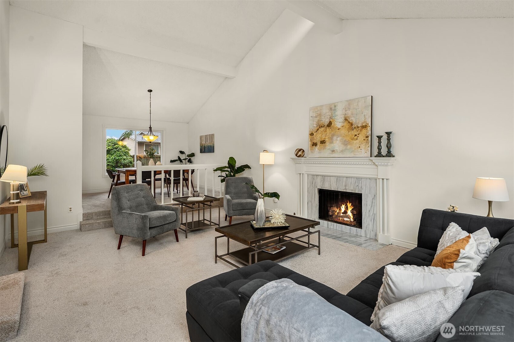 15710 Southeast 46th Way Bellevue, WA 98006 - Photo 6 of 40 a living room with furniture and a fireplace