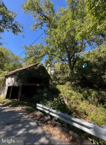 a view of a yard with an outdoor space