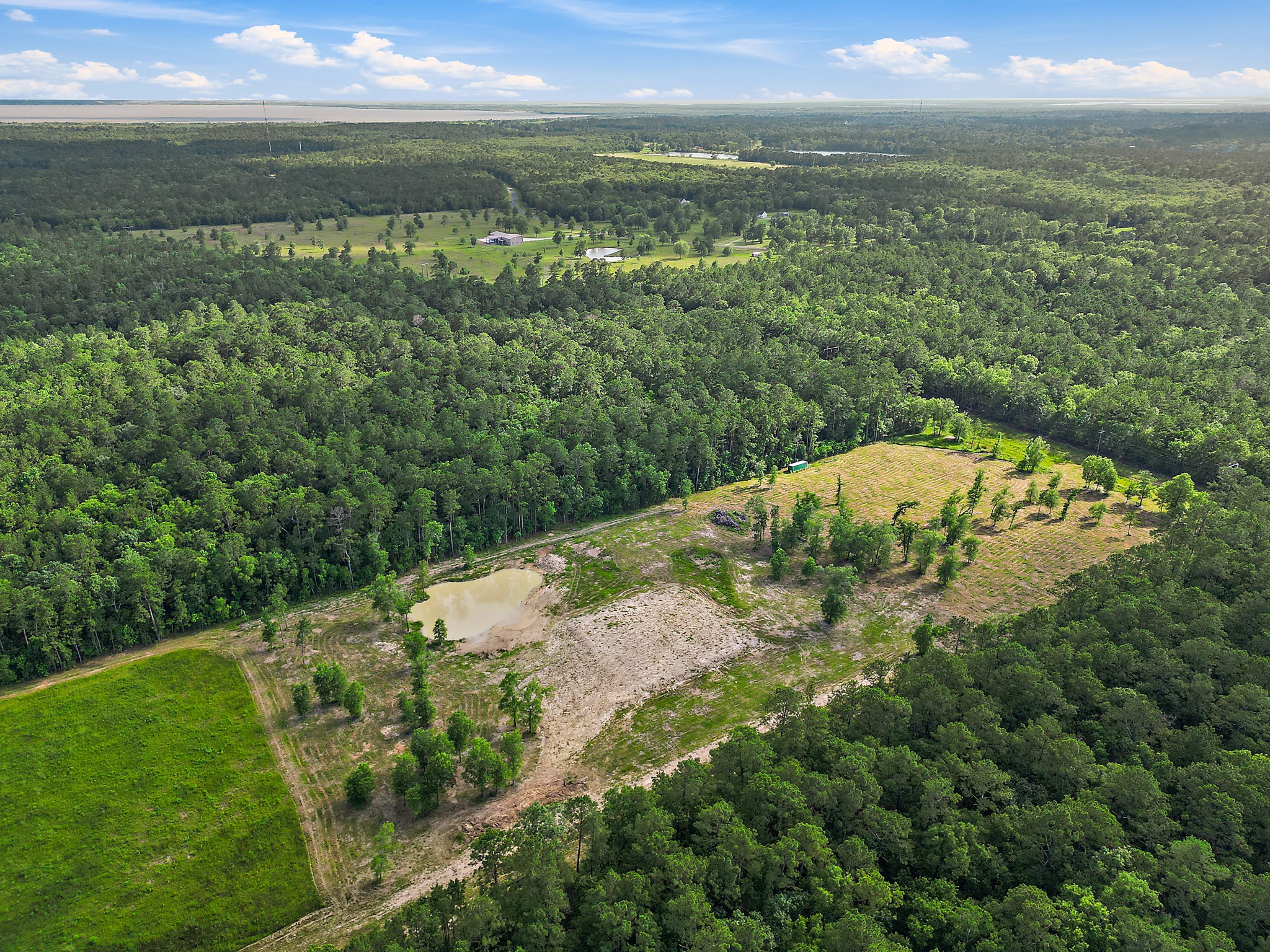 Tbd Labrador Lane Wallisville, TX 77597 - Photo 3 of 11 a view of lake with green space