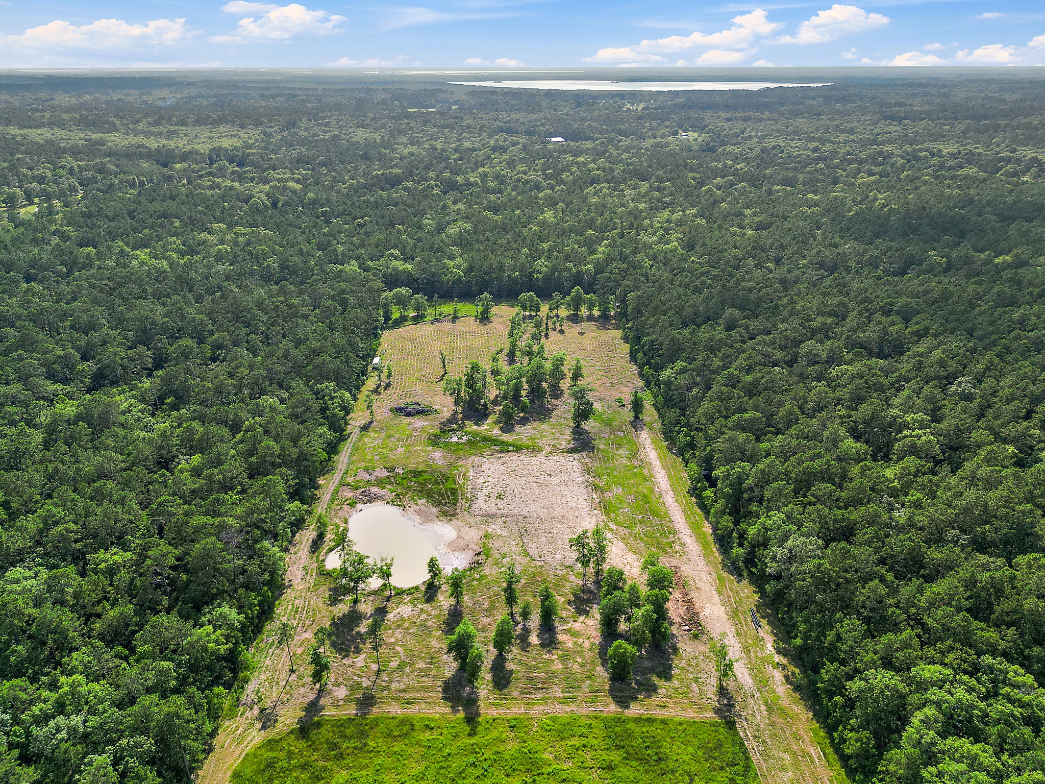 Tbd Labrador Lane Wallisville, TX 77597 - Photo 10 of 11 a view of a yard with an outdoor space
