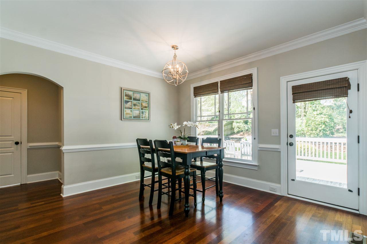 1407 Nottingham Road Raleigh, NC 27607 - Photo 13 of 30 a view of a dining room with furniture and window