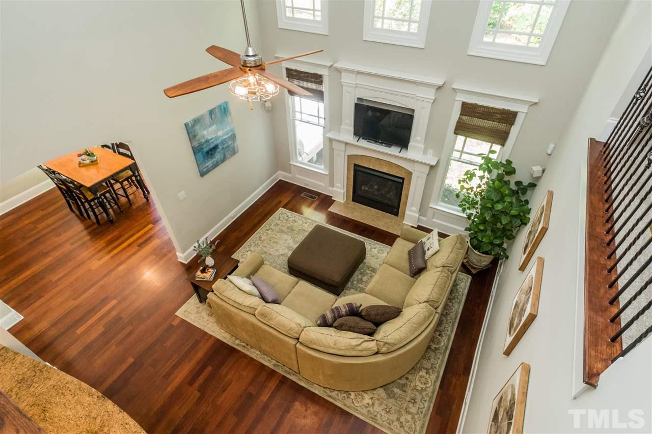 1407 Nottingham Road Raleigh, NC 27607 - Photo 17 of 30 a living room with furniture and a fireplace